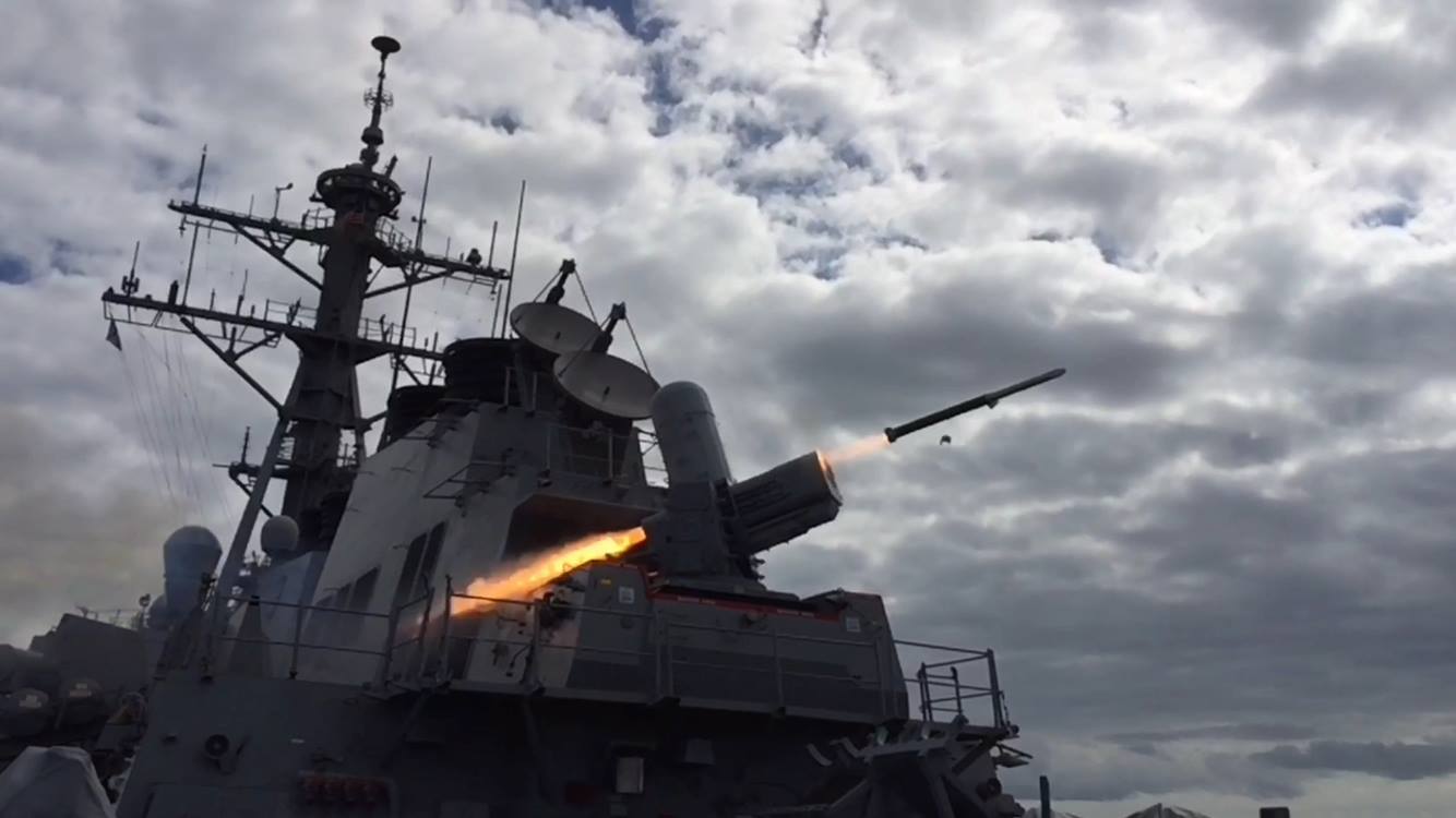 US Battleship, firing a SeaRAM guided missile, the newest of many anti-missile, anti-aircraft guided missile systems.